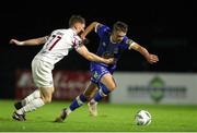 15 September 2023; Darragh Power of Waterford in action against Mikie Rowe of Cobh Ramblers during the SSE Airtricity Men's First Division match between Waterford and Cobh Ramblers at RSC in Waterford. Photo by Michael P Ryan/Sportsfile