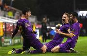 15 September 2023; Aaron Dobbs of Wexford, left, celebrates with team-mates Corban Piper, centre, and Darragh Levingston, right, after scoring their side's first goal during the Sports Direct Men’s FAI Cup quarter final match between Cork City and Wexford at Turner's Cross in Cork. Photo by Eóin Noonan/Sportsfile