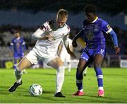 15 September 2023; Michael McCarthy of Cobh Ramblers in action against Serge Atakayi of Waterford during the SSE Airtricity Men's First Division match between Waterford and Cobh Ramblers at RSC in Waterford. Photo by Michael P Ryan/Sportsfile