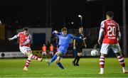 15 September 2023; Jason McClelland of St Patrick's Athletic shoots under pressure from Stephen Doherty of Finn Harps during the Sports Direct Men’s FAI Cup quarter-final match between Finn Harps and St Patrick's Athletic at Finn Park in Ballybofey, Donegal. Photo by Ramsey Cardy/Sportsfile