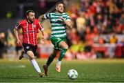 15 September 2023; Paul McMullan of Derry City in action against Lee Grace of Shamrock Rovers during the SSE Airtricity Men's Premier Division match between Derry City and Shamrock Rovers at The Ryan McBride Brandywell Stadium in Derry. Photo by Stephen McCarthy/Sportsfile