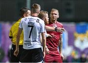 15 September 2023; Stephen Walsh of Galway United tussles with Daryl Horgan, centre, and Daniel Kelly, 7, of Dundalk during the Sports Direct Men’s FAI Cup quarter-final match between Galway United and Dundalk at Eamonn Deacy Park in Galway. Photo by Ben McShane/Sportsfile