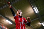 15 September 2023; A young Derry City supporter celebrates as Cameron McJannet of Derry City scores their side's first goal during the SSE Airtricity Men's Premier Division match between Derry City and Shamrock Rovers at The Ryan McBride Brandywell Stadium in Derry. Photo by Stephen McCarthy/Sportsfile