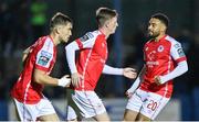 15 September 2023; Chris Forrester of St Patrick's Athletic, with teammates Anto Breslin, left, and Jake Mulraney, right, after scoring their side's first goal during the Sports Direct Men’s FAI Cup quarter-final match between Finn Harps and St Patrick's Athletic at Finn Park in Ballybofey, Donegal. Photo by Ramsey Cardy/Sportsfile