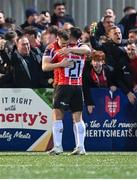 15 September 2023; Cameron McJannet of Derry City, left, celebrates with team-mate Danny Mullen after scoring their side's first goal during the SSE Airtricity Men's Premier Division match between Derry City and Shamrock Rovers at The Ryan McBride Brandywell Stadium in Derry. Photo by Stephen McCarthy/Sportsfile