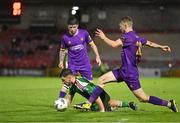 15 September 2023; Aaron Bolger of Cork City in action against Reece Webb of Wexford during the Sports Direct Men’s FAI Cup quarter final match between Cork City and Wexford at Turner's Cross in Cork. Photo by Eóin Noonan/Sportsfile