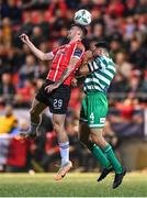 15 September 2023; Cian Kavanagh of Derry City in action against Roberto Lopes of Shamrock Rovers during the SSE Airtricity Men's Premier Division match between Derry City and Shamrock Rovers at The Ryan McBride Brandywell Stadium in Derry. Photo by Stephen McCarthy/Sportsfile