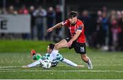 15 September 2023; Adam O'Reilly of Derry City in action against Trevor Clarke of Shamrock Rovers during the SSE Airtricity Men's Premier Division match between Derry City and Shamrock Rovers at The Ryan McBride Brandywell Stadium in Derry. Photo by Stephen McCarthy/Sportsfile