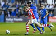 15 September 2023; Jay McGrath of St Patrick's Athletic in action against Billy Banda of Finn Harps during the Sports Direct Men’s FAI Cup quarter-final match between Finn Harps and St Patrick's Athletic at Finn Park in Ballybofey, Donegal. Photo by Ramsey Cardy/Sportsfile