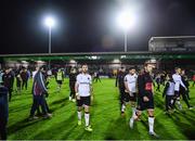 15 September 2023; Dundalk players, including Robbie McCourt, centre, leave the pitch after their defeat in the Sports Direct Men’s FAI Cup quarter-final match between Galway United and Dundalk at Eamonn Deacy Park in Galway. Photo by Ben McShane/Sportsfile