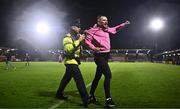 15 September 2023; A Cork City supporter is removed from the pitch by a member of An Garda Síochána during the Sports Direct Men’s FAI Cup quarter final match between Cork City and Wexford at Turner's Cross in Cork. Photo by Eóin Noonan/Sportsfile