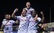 15 September 2023; Jonathan Afolabi of Bohemians, right, celebrates with teammates Kris Twardek, left, and James McManus, top, after scoring their side's third goal during the Sports Direct Men’s FAI Cup quarter-final match between Drogheda United and Bohemians at Weavers Park in Drogheda, Louth. Photo by Seb Daly/Sportsfile