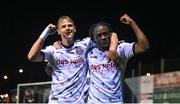 15 September 2023; Jonathan Afolabi of Bohemians, right, celebrates with teammate Kris Twardek after scoring their side's third goal during the Sports Direct Men’s FAI Cup quarter-final match between Drogheda United and Bohemians at Weavers Park in Drogheda, Louth. Photo by Seb Daly/Sportsfile