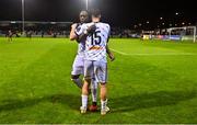 15 September 2023; Jonathan Afolabi of Bohemians, left, celebrates with teammate James Clarke after scoring their side's third goal during the Sports Direct Men’s FAI Cup quarter-final match between Drogheda United and Bohemians at Weavers Park in Drogheda, Louth. Photo by Seb Daly/Sportsfile