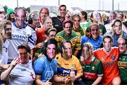 16 September 2023; Players from the Galbally team from Tyrone, wearing masks of well-known GAA personalities, during the 2023 LGFA/Sports Direct Gaelic4Mothers&Others National Blitz Day at Naomh Mearnóg GAA club in Portmarnock, Dublin. Photo by Piaras Ó Mídheach/Sportsfile