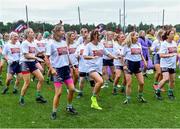 16 September 2023; Players during the warm-up before the 2023 LGFA/Sports Direct Gaelic4Mothers&Others National Blitz Day at Naomh Mearnóg GAA club in Portmarnock, Dublin. Photo by Piaras Ó Mídheach/Sportsfile