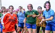 16 September 2023; Players from the Galbally team from Tyrone, wearing masks of well-known GAA personalities, during the 2023 LGFA/Sports Direct Gaelic4Mothers&Others National Blitz Day at Naomh Mearnóg GAA club in Portmarnock, Dublin. Photo by Piaras Ó Mídheach/Sportsfile