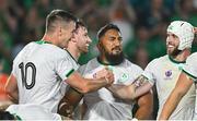 16 September 2023; Jonathan Sexton of Ireland, left, celebrates with teammates ìncluding Mack Hansen after scoring his side's fourth try to become his country's all-time record points scorer in international rugby during the 2023 Rugby World Cup Pool B match between Ireland and Tonga at Stade de la Beaujoire in Nantes, France. Photo by Brendan Moran/Sportsfile