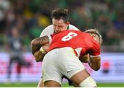 16 September 2023; Hugo Keenan of Ireland is tackled by Vaea Fifita of Tonga during the 2023 Rugby World Cup Pool B match between Ireland and Tonga at Stade de la Beaujoire in Nantes, France. Photo by Brendan Moran/Sportsfile
