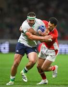16 September 2023; Rob Herring of Ireland is tackled by William Havili of Tonga during the 2023 Rugby World Cup Pool B match between Ireland and Tonga at Stade de la Beaujoire in Nantes, France. Photo by Brendan Moran/Sportsfile
