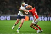 16 September 2023; Rob Herring of Ireland is tackled by William Havili of Tonga during the 2023 Rugby World Cup Pool B match between Ireland and Tonga at Stade de la Beaujoire in Nantes, France. Photo by Brendan Moran/Sportsfile