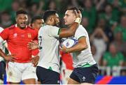 16 September 2023; James Lowe of Ireland celebrates with teammate Bundee Aki after scoring his side's fifth try during the 2023 Rugby World Cup Pool B match between Ireland and Tonga at Stade de la Beaujoire in Nantes, France. Photo by Brendan Moran/Sportsfile