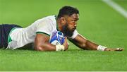 16 September 2023; Bundee Aki of Ireland dives over to score his side's sixth try  during the 2023 Rugby World Cup Pool B match between Ireland and Tonga at Stade de la Beaujoire in Nantes, France. Photo by Brendan Moran/Sportsfile