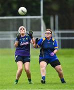 16 September 2023; 16 September 2023; Emma Mulvey of St Brigid's in Leitrim in action against Trish Byrne of Man O'War, right, during the 2023 LGFA/Sports Direct Gaelic4Mothers&Others National Blitz Day at Naomh Mearnóg GAA club in Portmarnock, Dublin. Photo by Piaras Ó Mídheach/Sportsfile