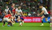 16 September 2023; Conor Murray of Ireland offloads a pass to teammate Garry Ringrose in the built up to their side's fourth try, scored by teammate Jonathan Sexton, not pictured, during the 2023 Rugby World Cup Pool B match between Ireland and Tonga at Stade de la Beaujoire in Nantes, France. Photo by Brendan Moran/Sportsfile