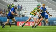 17 September 2023; Peter Lenihan of Blackrock in action against Luke Elliott, left, and Eoghan Murphy of Sarsfields during the Cork County Premier Senior Club Hurling Championship quarter-final match between Blackrock and Sarsfields at Páirc Uí Chaoimh in Cork. Photo by Eóin Noonan/Sportsfile