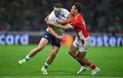 16 September 2023; Rob Herring of Ireland is tackled by William Havili of Tonga during the 2023 Rugby World Cup Pool B match between Ireland and Tonga at Stade de la Beaujoire in Nantes, France. Photo by Brendan Moran/Sportsfile