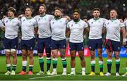16 September 2023; Ireland players, from left, Josh van der Flier, James Lowe, Caelan Doris, Andrew Porter, Bundee Aki, Hugo Keenan and Dave Kilcoyne during the national anthems before the 2023 Rugby World Cup Pool B match between Ireland and Tonga at Stade de la Beaujoire in Nantes, France. Photo by Brendan Moran/Sportsfile