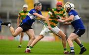 17 September 2023; Alan Connolly of Blackrock is tackled by Jack O'Connor, left, and Eoghan Murphy of Sarsfields during the Cork County Premier Senior Club Hurling Championship quarter-final match between Blackrock and Sarsfields at Páirc Uí Chaoimh in Cork. Photo by Eóin Noonan/Sportsfile