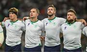 16 September 2023; Ireland players, from left, Josh van der Flier, James Lowe, Caelan Doris and Andrew Porter during the national anthems before the 2023 Rugby World Cup Pool B match between Ireland and Tonga at Stade de la Beaujoire in Nantes, France. Photo by Brendan Moran/Sportsfile
