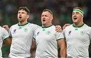 16 September 2023; Ireland players, from left, Hugo Keenan, Dave Kilcoyne and Rob Herring during the national anthems before the 2023 Rugby World Cup Pool B match between Ireland and Tonga at Stade de la Beaujoire in Nantes, France. Photo by Brendan Moran/Sportsfile