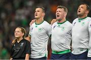 16 September 2023; Ireland players, from left, captain Jonathan Sexton, Peter O’Mahony and Tadhg Beirne during the national anthems before the 2023 Rugby World Cup Pool B match between Ireland and Tonga at Stade de la Beaujoire in Nantes, France. Photo by Brendan Moran/Sportsfile