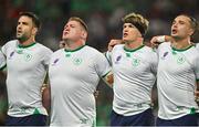 16 September 2023; Ireland players, from left, Conor Murray, Tadhg Furlong, Josh van der Flier and James Lowe during the national anthems before the 2023 Rugby World Cup Pool B match between Ireland and Tonga at Stade de la Beaujoire in Nantes, France. Photo by Brendan Moran/Sportsfile