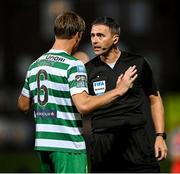 15 September 2023; Referee Paul McLaughlin speaks to Daniel Cleary of Shamrock Rovers during the SSE Airtricity Men's Premier Division match between Derry City and Shamrock Rovers at The Ryan McBride Brandywell Stadium in Derry. Photo by Stephen McCarthy/Sportsfile