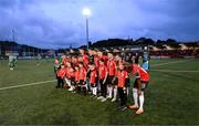 15 September 2023; Derry City players and mascots pose for a photograph before the SSE Airtricity Men's Premier Division match between Derry City and Shamrock Rovers at The Ryan McBride Brandywell Stadium in Derry. Photo by Stephen McCarthy/Sportsfile