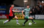 15 September 2023; Ronan Finn of Shamrock Rovers in action against Michael Duffy of Derry City during the SSE Airtricity Men's Premier Division match between Derry City and Shamrock Rovers at The Ryan McBride Brandywell Stadium in Derry. Photo by Stephen McCarthy/Sportsfile