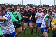 16 September 2023; Players from the Galbally team from Tyrone, wearing masks of well-known GAA personalities, during the 2023 LGFA/Sports Direct Gaelic4Mothers&Others National Blitz Day at Naomh Mearnóg GAA club in Portmarnock, Dublin. Photo by Piaras Ó Mídheach/Sportsfile