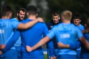 18 September 2023; Leinster players, from left, Jason Jenkins, Sam Prendergast and Liam Molony in a huddle during a Leinster rugby squad training session at UCD in Dublin. Photo by Harry Murphy/Sportsfile