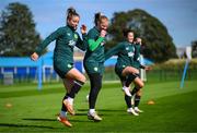 18 September 2023; Players, from left, Chloe Mustaki, Courtney Brosnan, Marissa Sheva and Abbie Larkin during a Republic of Ireland women training session at the FAI National Training Centre in Abbotstown, Dublin. Photo by Stephen McCarthy/Sportsfile