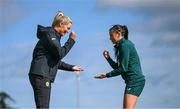 18 September 2023; Interim assistant coach Emma Byrne and Abbie Larkin play &quot;rock, paper, scissors&quot; as part of a warm-up drill during a Republic of Ireland women training session at the FAI National Training Centre in Abbotstown, Dublin. Photo by Stephen McCarthy/Sportsfile