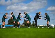 18 September 2023; Players, from left, Saoirse Noonan, Claire O'Riordan, Marissa Sheva, Louise Quinn, interim assistant coach Emma Byrne and Abbie Larkin play &quot;rock, paper, scissors as part of a warm-up drill during a Republic of Ireland women training session at the FAI National Training Centre in Abbotstown, Dublin. Photo by Stephen McCarthy/Sportsfile