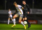 18 September 2023; Kris Twardek of Bohemians in action against Jordan Buckley of Usher Celtic during the Leinster Football Senior Cup Final match between Usher Celtic and Bohemians at Dalymount Park in Dublin. Photo by Sam Barnes/Sportsfile