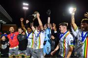 18 September 2023; Cian Byrne of Bohemians, centre, lifts the cup and celebrates with team-mates after his side's victory in the Leinster Football Senior Cup Final match between Usher Celtic and Bohemians at Dalymount Park in Dublin. Photo by Sam Barnes/Sportsfile