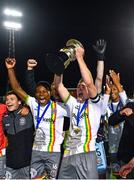 18 September 2023; Cian Byrne of Bohemians, centre, lifts the cup and celebrates with team-mates after his side's victory in the Leinster Football Senior Cup Final match between Usher Celtic and Bohemians at Dalymount Park in Dublin. Photo by Sam Barnes/Sportsfile