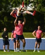 19 September 2023; Dan Sheehan lifts Ryan Baird during an Ireland rugby squad training session at Complexe de la Chambrerie in Tours, France. Photo by Brendan Moran/Sportsfile