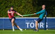 19 September 2023; Robbie Henshaw with head of physiotherapy Phil Glasgow during an Ireland rugby squad training session at Complexe de la Chambrerie in Tours, France. Photo by Brendan Moran/Sportsfile